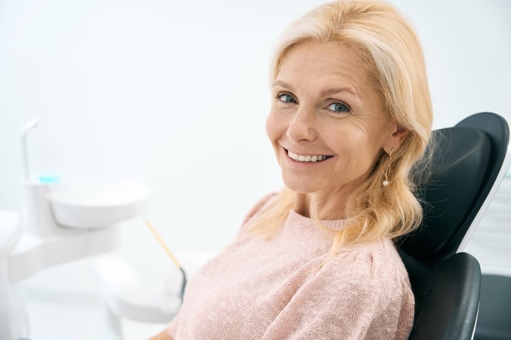 Middle aged woman at the dentist - Dental Bridge in Georgetown, TX