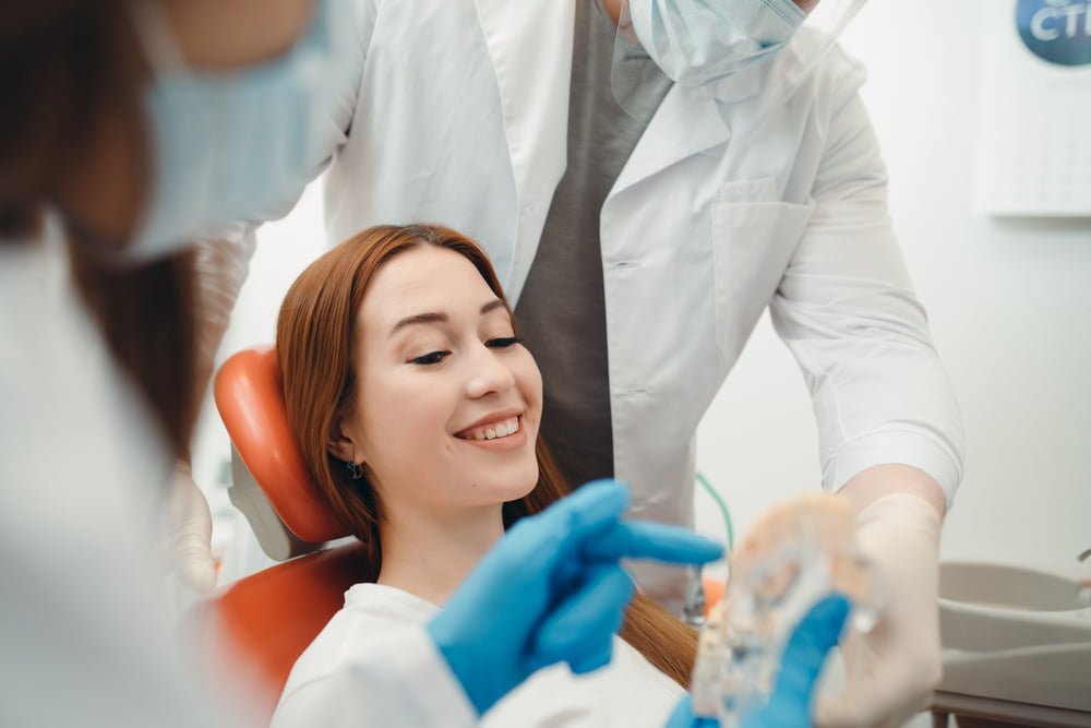 Woman on a dental assessment - Dental Bridge in Georgetown, TX