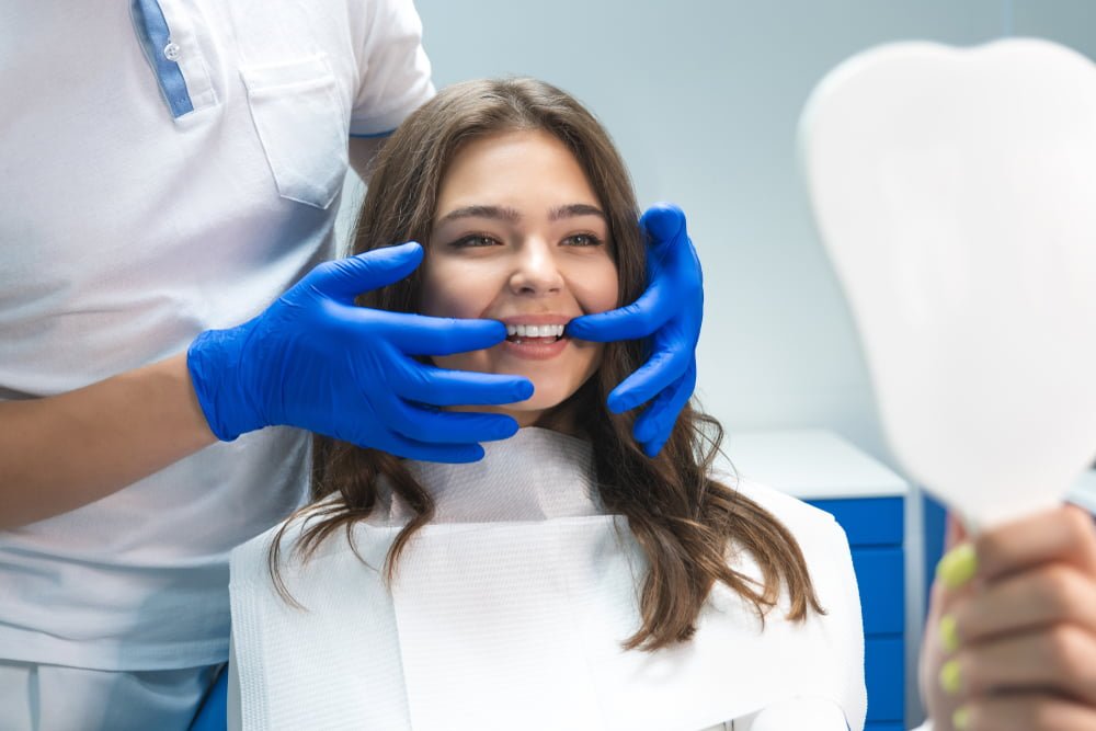 Woman having a dental check up - Dental Veneers in Georgetown, TX